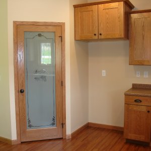 New Model in Decorah, pantry door